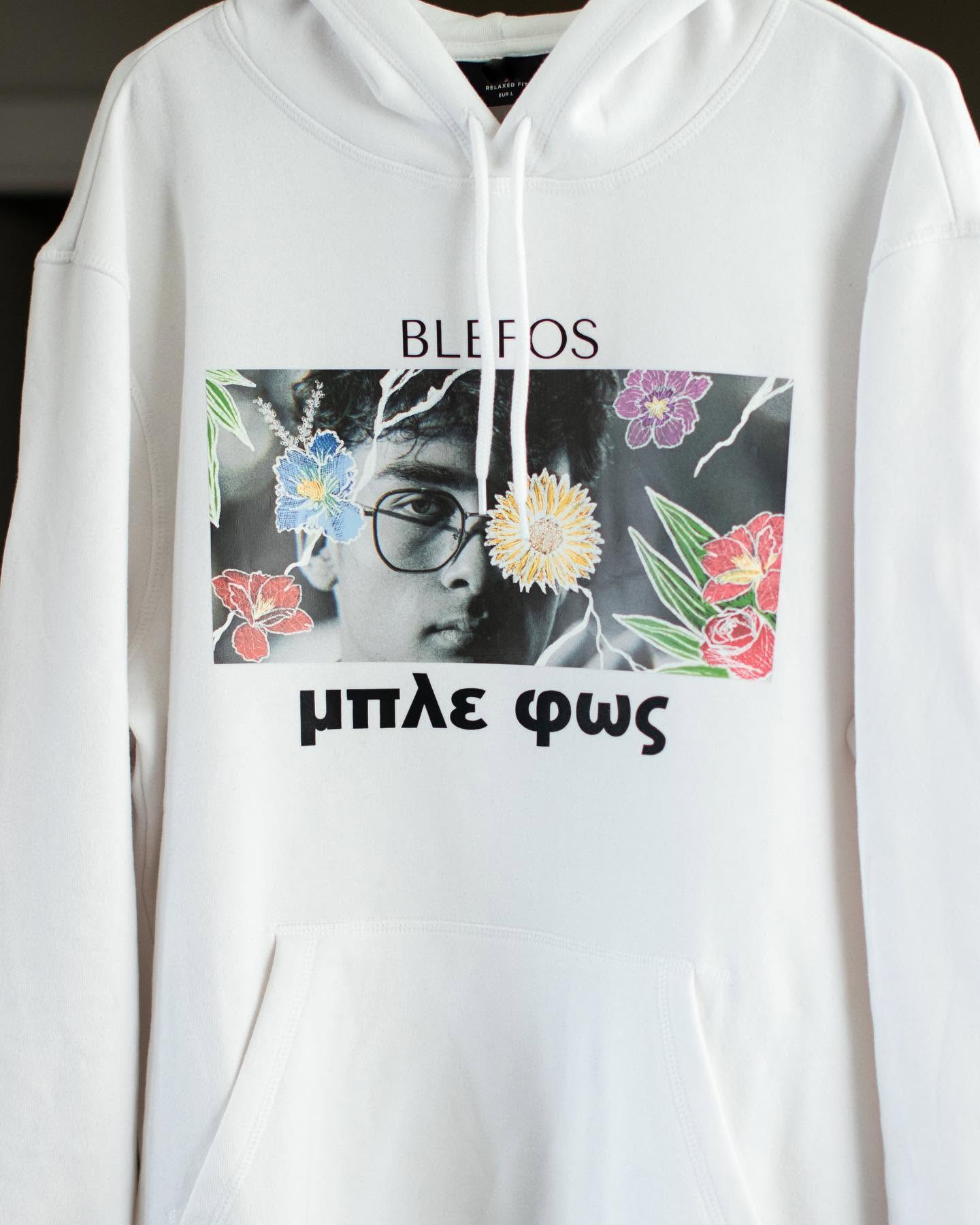 BleFos giveaway hoodie with a floral collage and glasses portrait